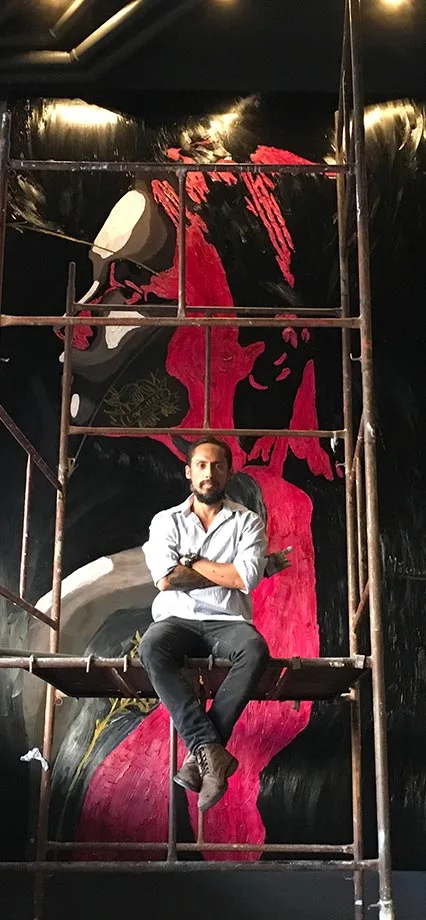 Monumental painted panel installation interacting with physical space and raw human presence.