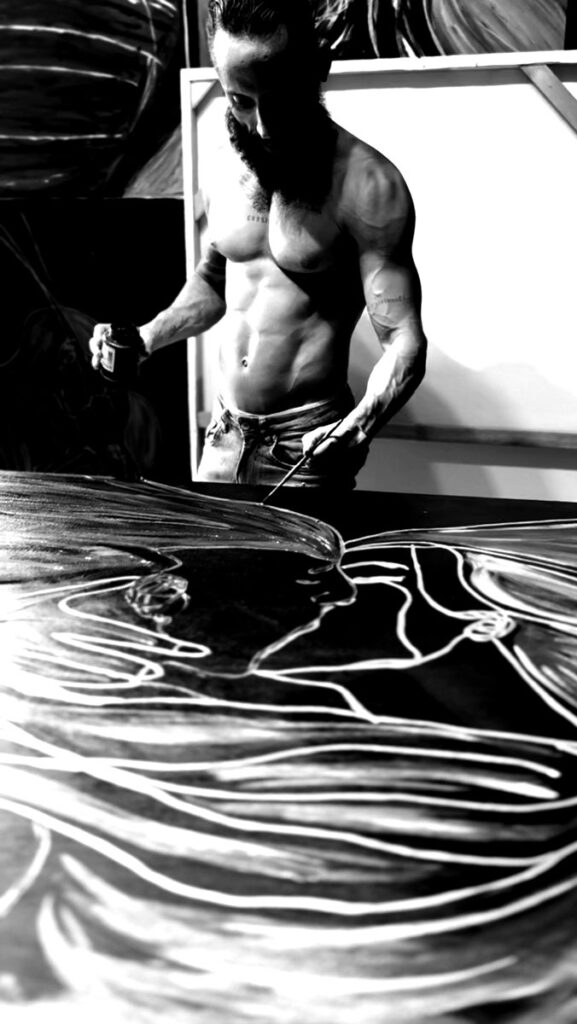 Brazilian artist Juca Máximo painting Gravity XV shirtless in his studio — a gestural, emotional artwork created through body movement, breath and physical presence.