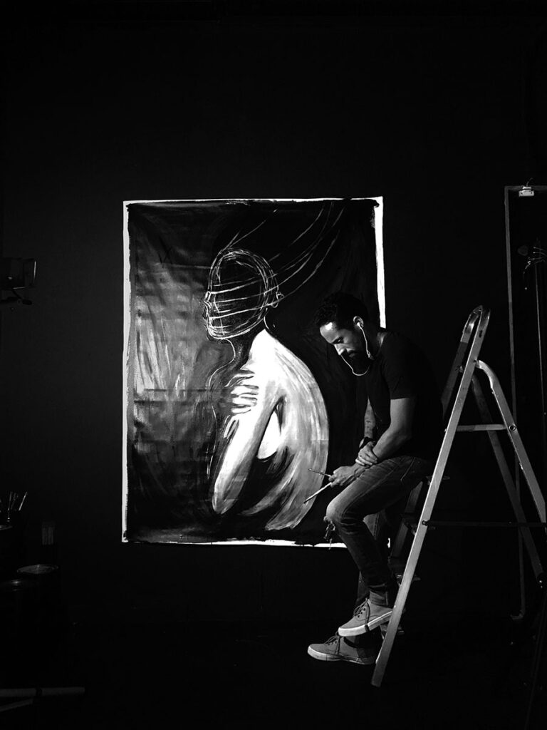 Artist Juca Máximo painting in his studio, exploring gesture, silence and the power to act through contemporary expressive painting.